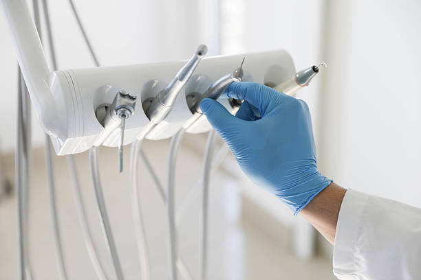 Professional Dental Implants technician working in Lamar, MO